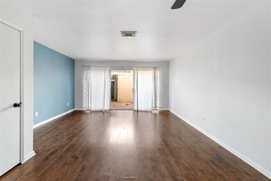 This other view of the living and dining space loo