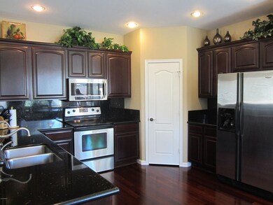 Stainless Steel Appliances, Wood Floords