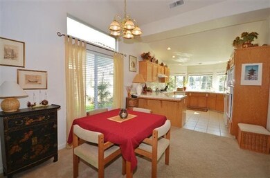Its a bright and sunny kitchen with canned lights,