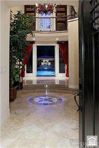 Front Door Entrance through to backyard pool and e