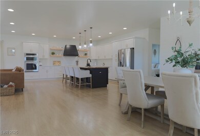 Dining space featuring a chandelier, recessed ligh