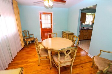 Formal dining room with access to rear porch