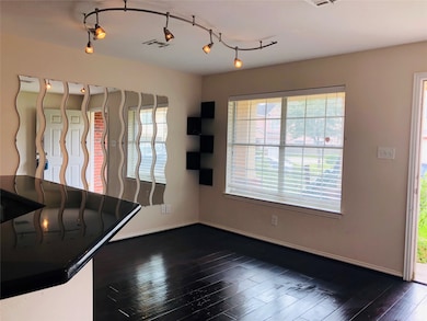 A generous dining room area, ideal for entertainin