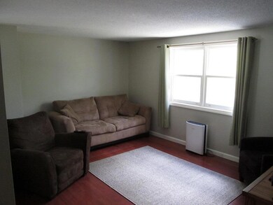 Living room with new hardwood flooring.