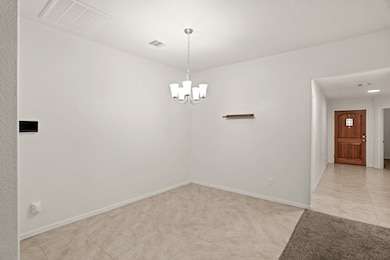 Further into the floorplan is your Formal Dining area. This is a perfect space for those special gatherings.