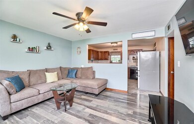 The separation between the living room and kitchen