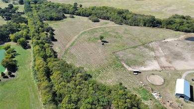 Aerial view of property's location with rural landscape