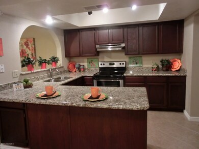 Kitchen opens to Back Great Room