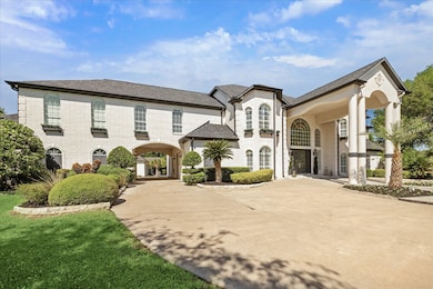 This estate features a porte-cochere that leads to your three-car garage and backyard oasis.