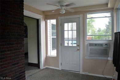Sunroom has access to backyard deck.