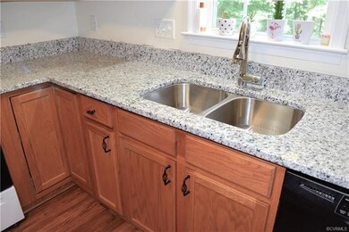 New granite in the kitchen and half bath is beauti