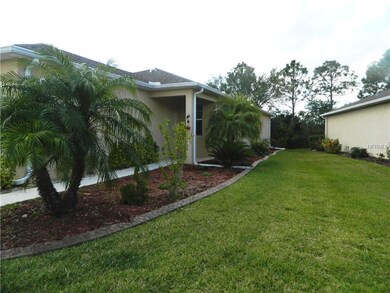 The home has lovely landscaping and a nice lawn.
