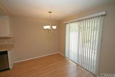 Close up of eating area. Notice sliding door which leads to front balcony