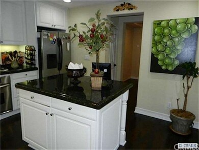 Kitchen looking toward hall to entrance
