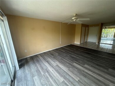 Empty room featuring wood finished floors, a ceili