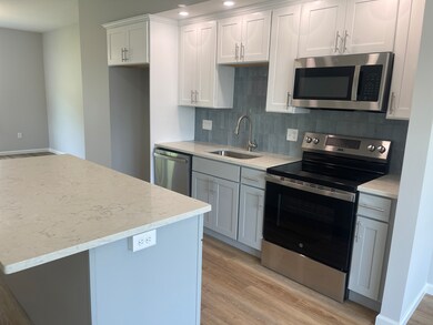 Kitchen will be similar to whats shown in photo