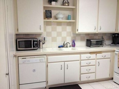 Kitchen has Dishwasher, disposal and free standing