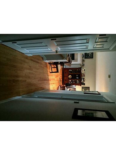 Den/Family/Great Room. Hallway to living area