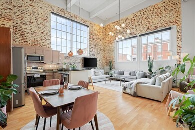 Dining space with beamed ceiling, a towering ceili