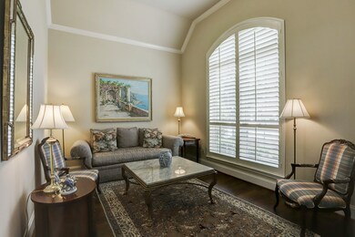 The formal living room awaits you on the right as you enter the home.  Hardwood floors, and plantation shutters, a perfect place for coffee in the morning.