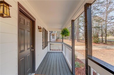 Wooden deck featuring a porch