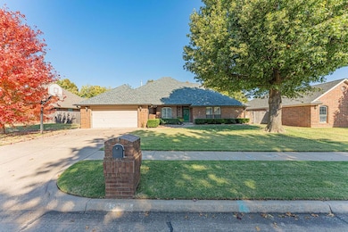 Ranch-style home featuring brick siding, concrete driveway, a shingled roof, and an attached garage
