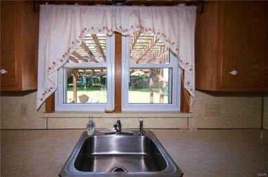 Kitchen with view to lovely back yard