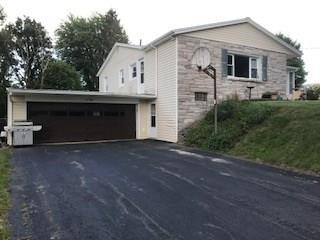 This house is a raised ranch with a two-car garage