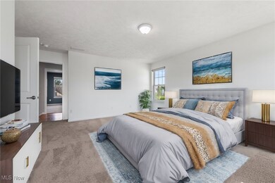  *Virtually Staged Bedroom with a textured ceiling and light colored carpet