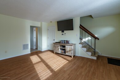 Living area with hardwood floors