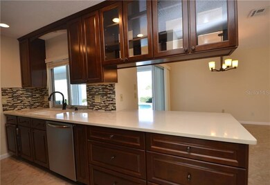 ...stainless appliances, pass thru window to lanai