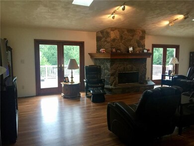 ANOTHER VIEW OF OPEN FLOOR PLAN SHOWING DOUBLE FRE