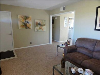 Open living room with painted wood work.