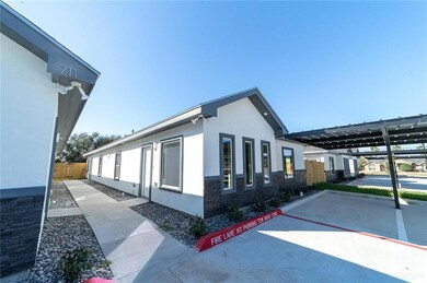 View of home's exterior featuring a carport