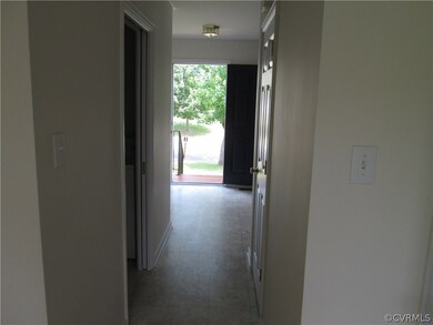 Foyer with 1/2 bath Powder Rm and Laundry Rm access