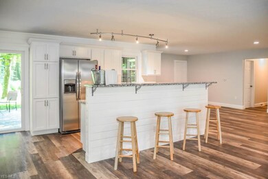 The kitchen has a breakfast bar and a pantry.