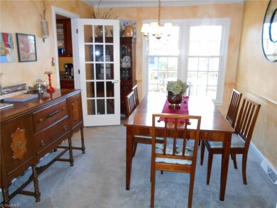 Formal dining room with lots of natural light