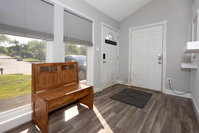 Nice foyer that leads to garage.