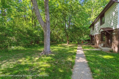 3940 Hunters Ridge Dr unit 3, Lansing, MI 48911 - photo 5