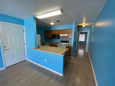 Unit M Entry, view toward kitchen