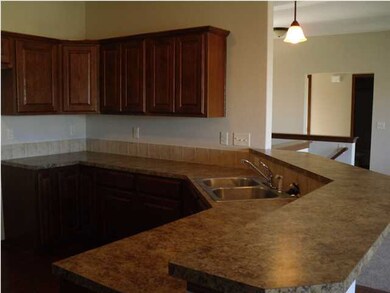 Open to the Living and Dining Rooms