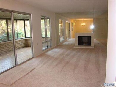 Roomy and bright living room. Wood burning  firepl