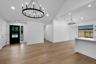 As you walk into front door , you are greeted by bright , light - filled spaces