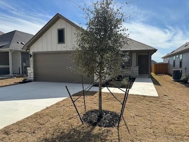 Ranch-style home with board and batten siding, co