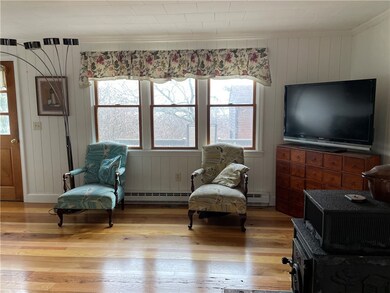 Open Family Room faces East Passage of Narraganset