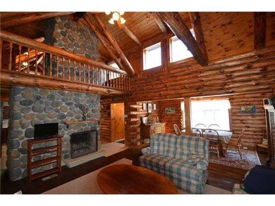 Living Room. Two-story living room with adjoining 