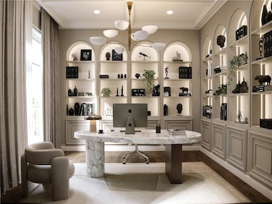 Wine room featuring built in features and wood finished floors