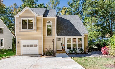 View of front of property with a garage
