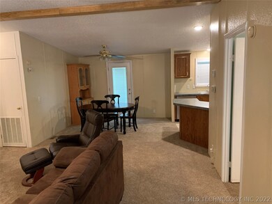 back door leads to multi-level, covered deck