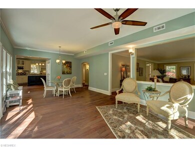 Large family room with a wall of windows and a sli